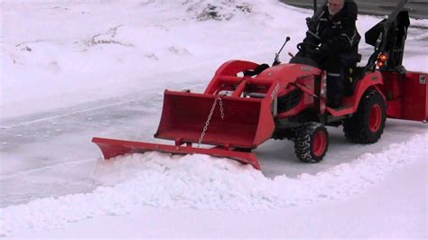 Snow Blades, Buckets and Blowers 